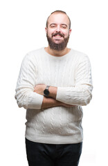 Young caucasian hipster man wearing winter sweater over isolated background happy face smiling with crossed arms looking at the camera. Positive person.