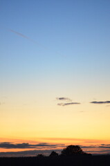 Beautiful sky background - Sunset Sunrise sky with light clouds and real sun