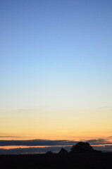 Beautiful sky background - Sunset Sunrise sky with light clouds and real sun