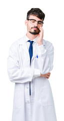 Young professional scientist man wearing white coat over isolated background thinking looking tired...