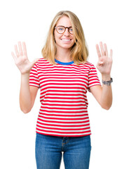 Fototapeta premium Beautiful young woman wearing glasses over isolated background showing and pointing up with fingers number nine while smiling confident and happy.