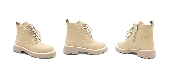 Fashionable leather lace-up boots isolated on white background. View from all sides.