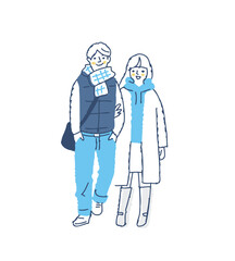 並んで歩いている冬服の若いカップル