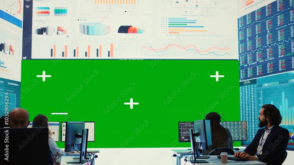 Poster business partners working in telecommunications control room with a big isolated mockup screen, revi