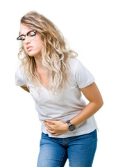 Beautiful young blonde woman wearing glasses over isolated background Suffering of backache, touching back with hand, muscular pain