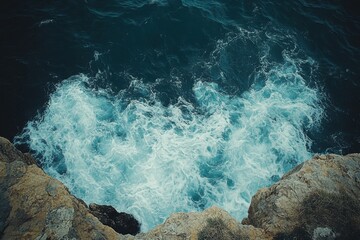 Wave coming up from the rocks in the ocean