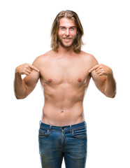 Fototapeta premium Young handsome shirtless man with long hair showing sexy body over isolated background looking confident with smile on face, pointing oneself with fingers proud and happy.