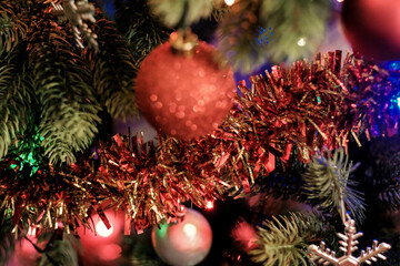 Christmas decorations and ornaments on the Christmas tree during the December Christmas and Happy New Year holidays