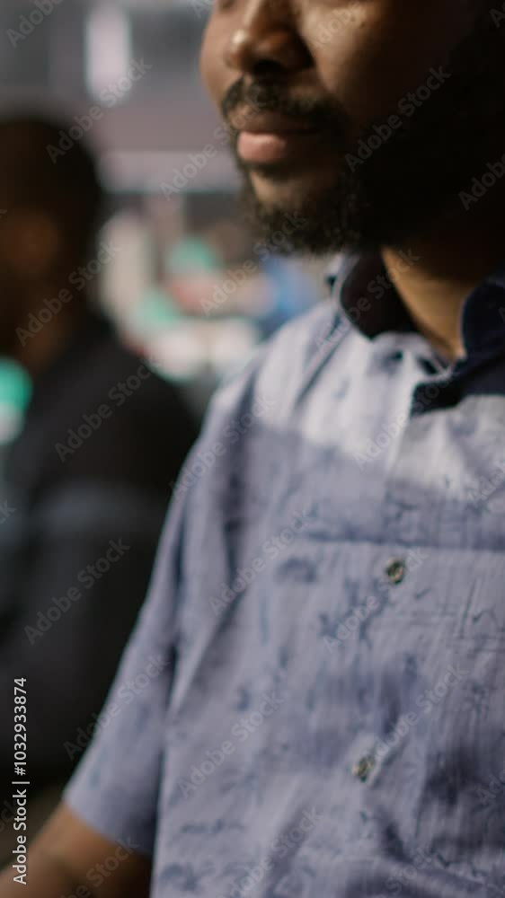 Poster vertical video man doing data entry, typing on keyboard on pc, solving tasks. close up of office cle