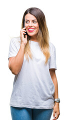 Fototapeta premium Young beautiful woman speaking calling using smartphone over isolated background with a happy face standing and smiling with a confident smile showing teeth
