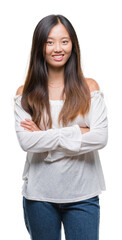 Young asian woman over isolated background happy face smiling with crossed arms looking at the camera. Positive person.