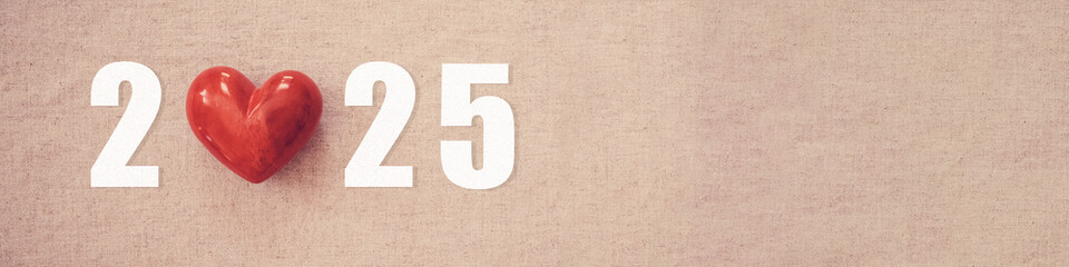 2025 with red heart. Happy New Year for heart health insurance, donation and medical concept, New...