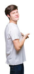 Young handsome man wearing casual white t-shirt over isolated background Inviting to enter smiling natural with open hand