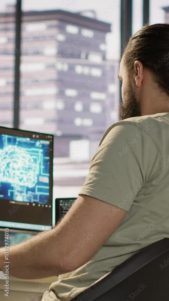 Poster vertical video employee utilizing ai resources and platforms to train and deploy machine learning mo