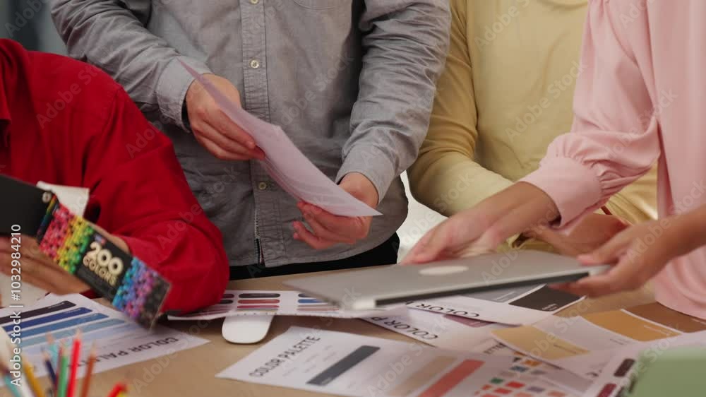 Poster designer team brainstorming and choosing color for graphic design working with client chromatic cons