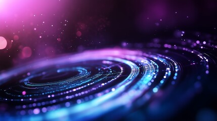 Fototapeta premium A vibrant, abstract image featuring swirling patterns of light in shades of purple and blue, evoking a sense of cosmic energy and motion.