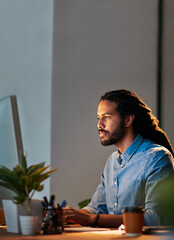 African man, computer and night for research, communication or project management in office with...