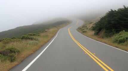 Fototapeta premium Misty Road Through Foggy Landscape