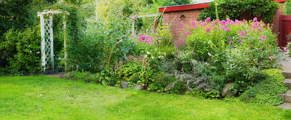 Trees, garden and grass field with flowers, plants or greenery for natural growth or conservation...