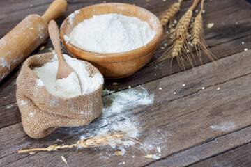 White wheat flour with barley ears, rice, natural agricultural food, top view.