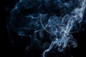 Smoke from flames or fog clouds graphic design art isolated on dark black background.