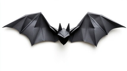 Black bat silhouette made from paper, classic Halloween decoration, isolated on white background