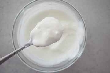 fresh yogurt in a bowl on table 