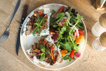 Healthy Sandwich and Fresh Mixed Green Salad on Plate