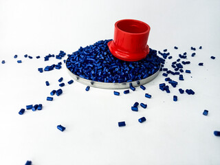 Blue polymer masterbatch granules isolated on white background for plastic product profile catalog...