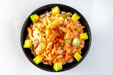 Salmon don rice. ingredient : fish meat , salmon belly , avocado