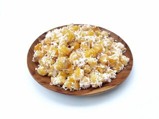 Urab jagung or Indonesian traditional foods Made from boiled corn with grated coconut. famous in West Java, isolated on white background 