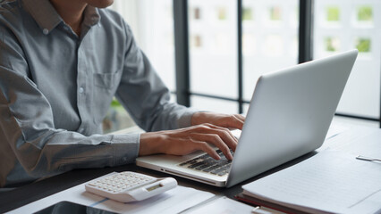 Business man accountant financial analyst and auditor working and laptop for calculating 