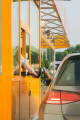 Car Making Payment at Drive-Through