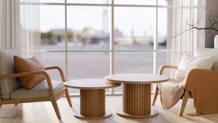 A comfortable Scandinavian living room featuring wooden armchairs and a stylish wooden coffee table.