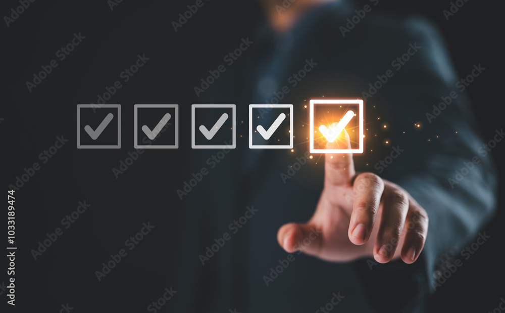 Poster Businessman ticking checkmark on a box in the list Show on the virtual screen. Checklist Ideas in Business Survey items and questionnaires. copy space
