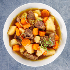 beef stew cooked with carrots, potatoes, herbs and broth