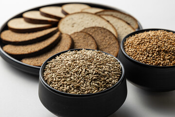 Artisan Bread Slices with Grains and Herb Butter