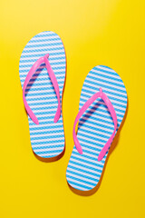 A vibrant summer vacation scene with flip flops