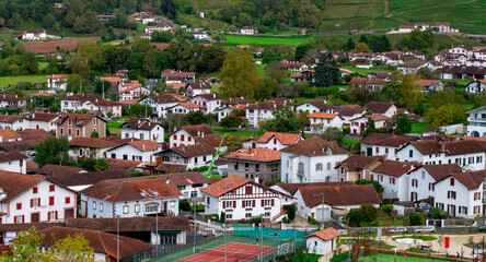 Saint Jean Pied de Port. A lot of houses and a green tennis court