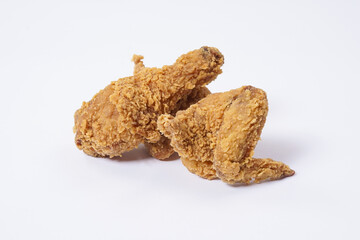 Fried Chicken breast hot crispy strips crunchy chicken tenders three pieces isolated on white background. Crispy fried chicken is a food made from fried chicken placed on a plate.