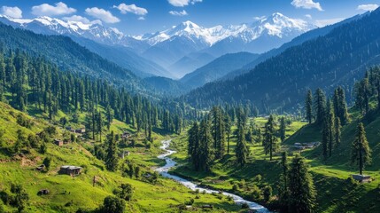 Fototapeta premium A scenic view of a lush green valley with a winding river, surrounded by snow-capped mountains.