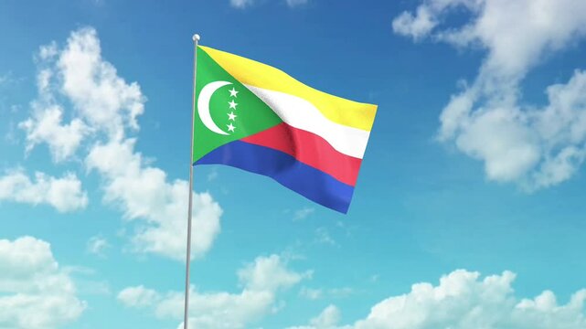 The national flag of Comoro, fluttering in the blue sky.