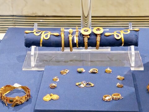 Cairo, Egypt, October 6 2024: Dush treasure, golden wreath, two bracelets, two gold necklaces made of 187 plaques in The National Museum of Egyptian Civilization (NMEC), located in Old Cairo