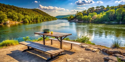 Obraz premium Picnic table and BBQ on Colorado River in Austin Texas