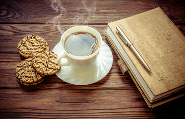 Coffee Break - Notepad and Pen along with coffee
