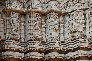 Carved idols on the outer wall of Shri Kapileshwar Mahadev Mandir, Velhale, near Bhusawal, Maharashtra, India