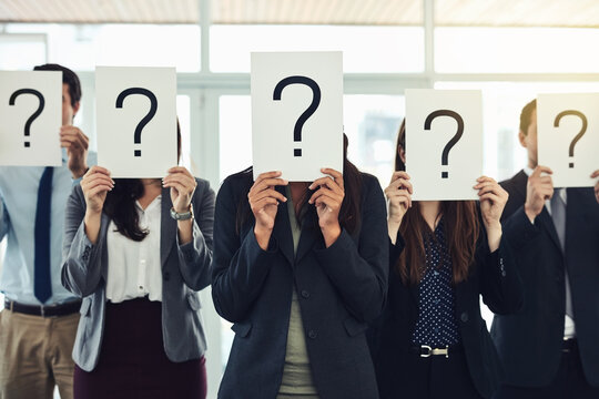 Question mark, group and paper in office, business and colleagues with sign, clueless or professional. Asking, mystery and corporate people with cover, teamwork and uncertain at work and confusion - Powered by Adobe
