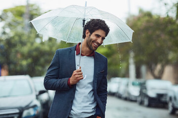 Businessman, city and umbrella for life insurance, investment and risk as professional in company,...