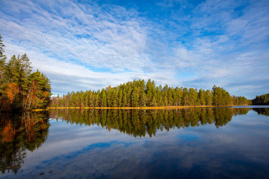 Beautiful Finnish autumn landscape by the water.
