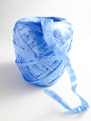 Blue plastic ribbon rope isolated on white background